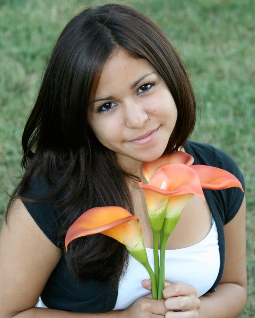 Teen girl with flower